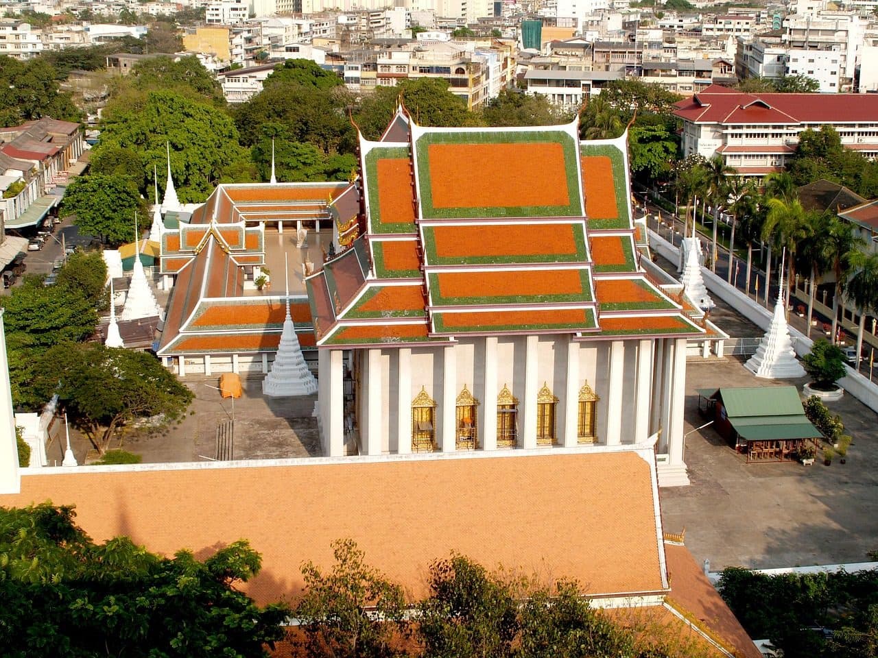 A temple's orange-tiled roofs seen from above, from the Golden Mount